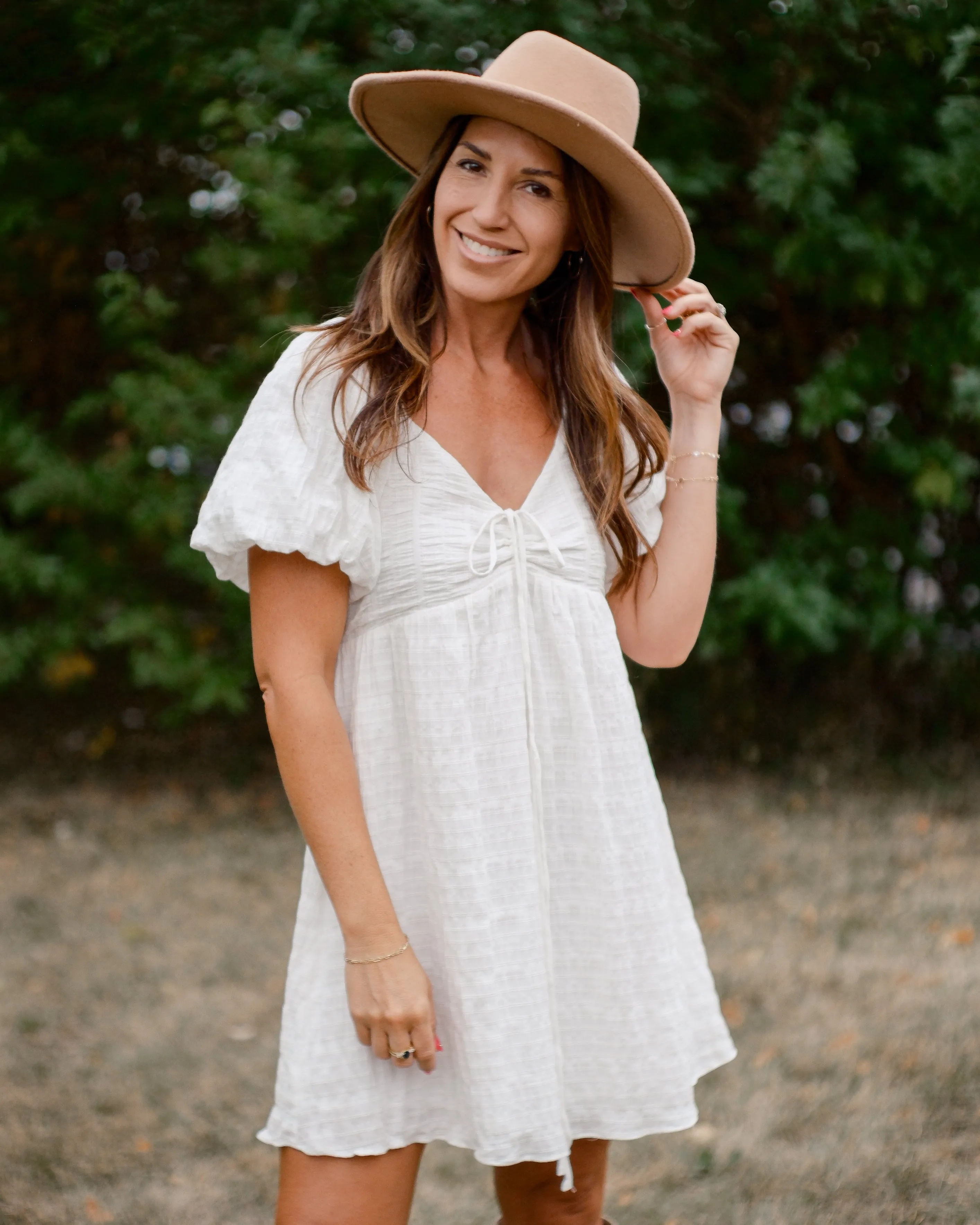 PURE SWEETNESS TEXTURED PUFF SLEEVE TIE  MINI DRESS - WHITE